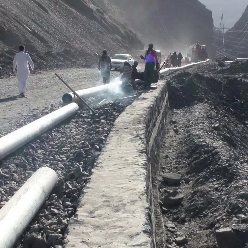 Water supply pipes being shifted from under-construction road