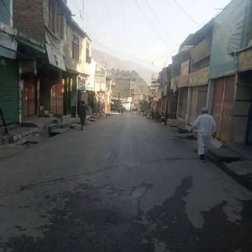 Chitral Bazar gives a deserted look as traders union decided to keep shutters down on Sunday. Aug 24, 2025.