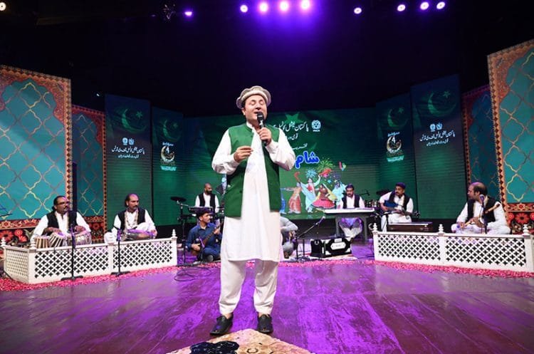 Mansoor Shabab performing on stage at PNCA during Sham-e-Music Independence Day celebration.--APP