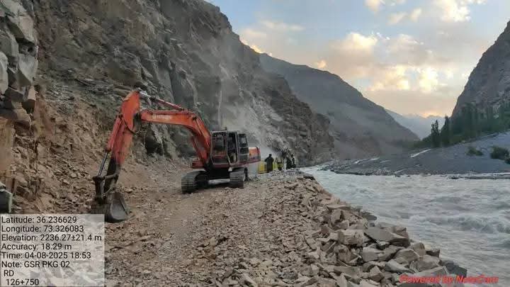 NHA staff working to reopen Shandur-Chitral road at Ghalti in Ghizer after blockade by flash floods.
