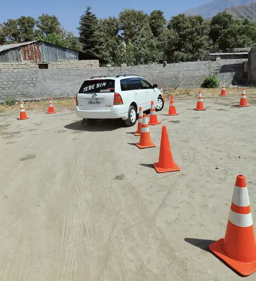 An applicant undergoes driving test conducted by Lower Chitral police at Zargarandeh.