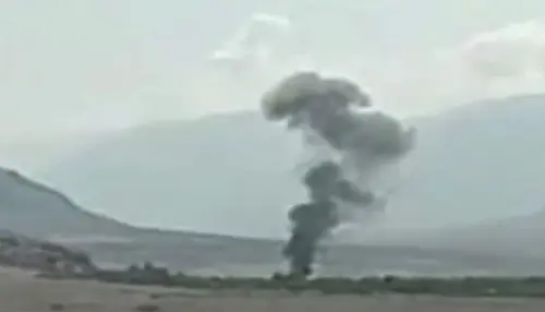 Smoke rises from the ground near Chilas in Gilgit-Baltistan after a govt helicopter crashed there on Sept 1, 2025.