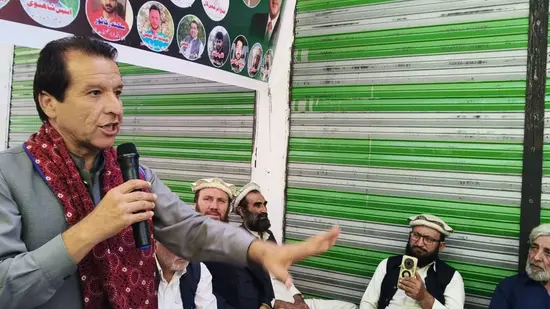 Shahzada Khalid Pervez speaks at a gathering of PPP Lower Chitral where he announced to rejoin the party.