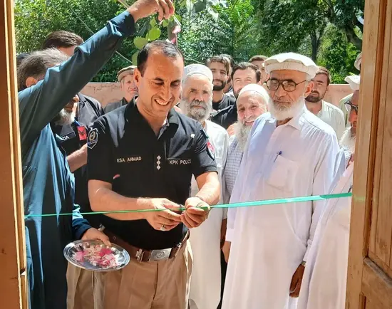 SDPO Bumburet Ahmed Isa cuts a ribbon to inaugurated Dispute Resolution Council office in Ayun Lower Chitral.