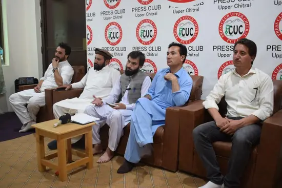 All Primary School Teachers Association representatives speak at a presser at Upper Chitral Press Club against govt plan to outsource schools, Sept 5, 2025.