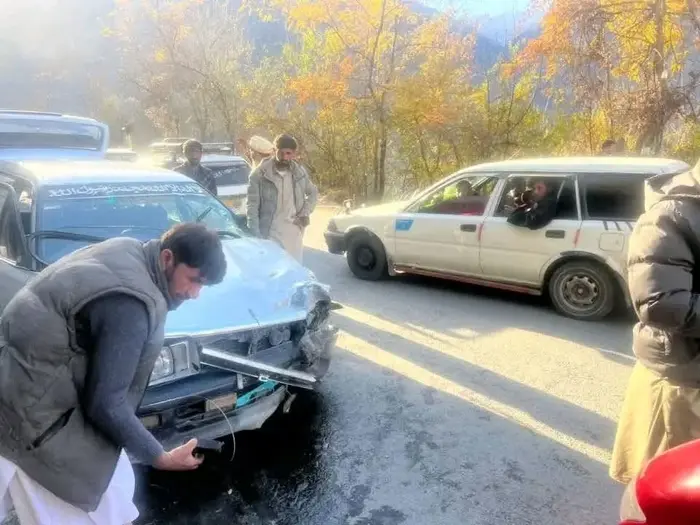 People look at a van after it collided with a rickshaw at Bakrabad leaving four women and three men injured.