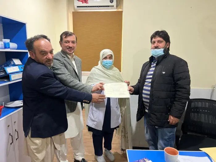 Dr Iffat Kehkashan of DHQ hospital Chitral given commendation certificate for professionalism.