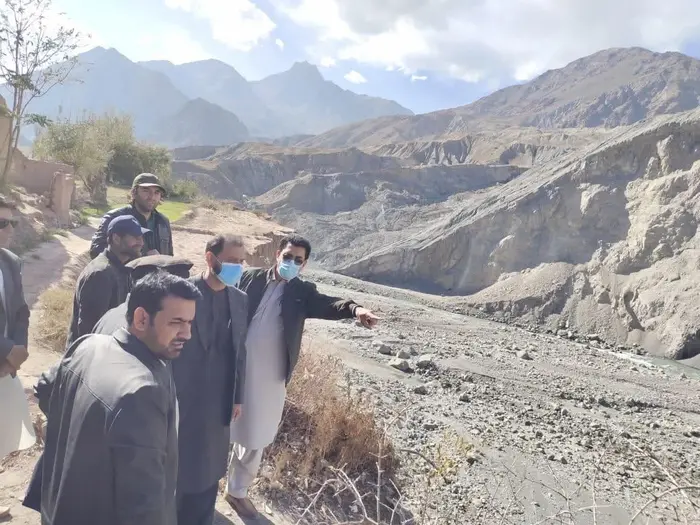 Officials survey Shader Reshun to prepare a plan for diversion of river Yarkhun to save area from erosion.