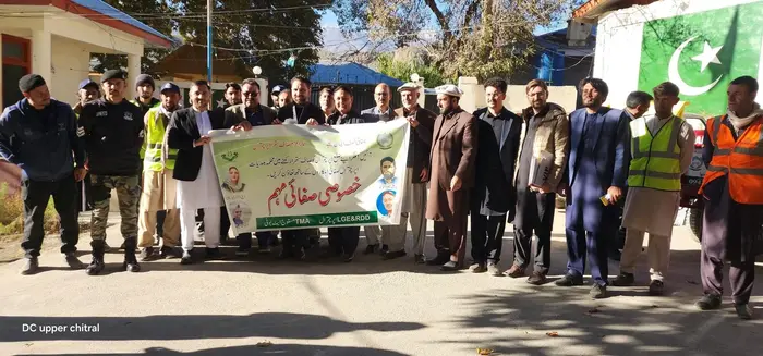 Walk held in Booni in connection with week-long cleanliness campaign.