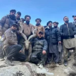 American national Thomas Garrick Steele and locals pictured with the Markhor he killed in Toshi Shaha Lower Chitral on Dec 11, 2025.