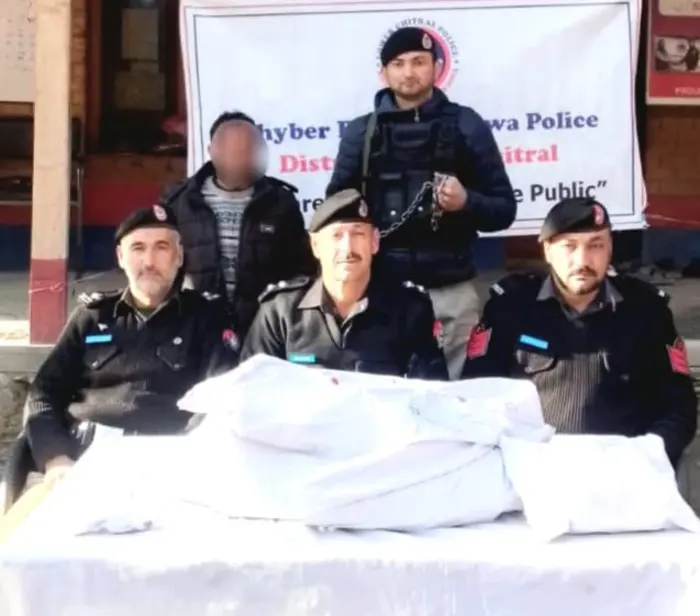 Man arrested with liquor in Rumbur valley of Chitral in custody of police, Dec 6, 2025.