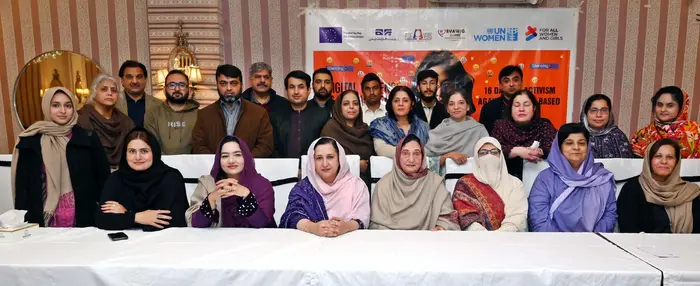 Aurat Foundation and other activists at the launch of a report on violence against women in KP.