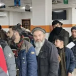 Rush outside Bank of Khyber branch in Chitral to obtain e stamp paper.