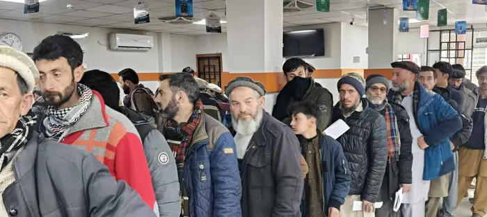 Rush outside Bank of Khyber branch in Chitral to obtain e stamp paper.