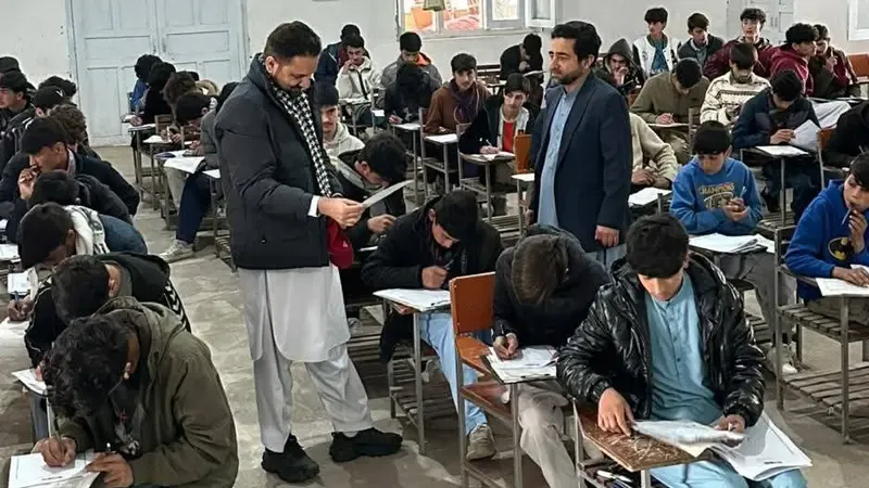 Students attempting their paper of Matric annual exam 2026 at Govt High School Booni, Chitral