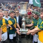 Winning captain receives trophy of pre-Shandur tournament 2026 in Chitral.