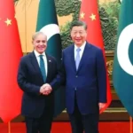 President XI shakes hands with Prime Minister Shehbaz Sharif before a meeting in Beijing, May 25, 2026.