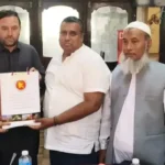 Iqbal Hussain Khan, high commissioner of Bangladesh presents a souvenir to Chitral Chamber of Commerce representative in Chitral.