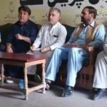 Contractors in Chitral speaking at a press conference alleging corruption in C&W department.