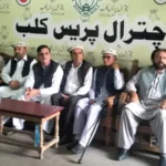 Salim Khan and other PPP leaders addressing a press in Chitral against non-inclusion of Dorah road in ADP.
