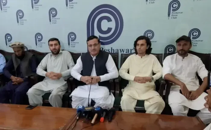 PPP leader Saleem Khan from Chitral addresses a press conference in Peshawar about flood 2026
