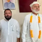 DEO Male Upper Chitral Dr Abdul Malik welcomed to office by staff.