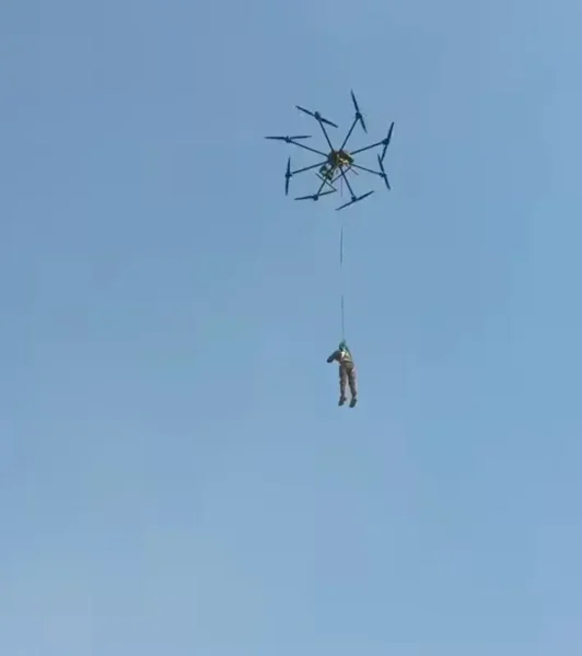 A drone bring used to rescue stranded people in floods.