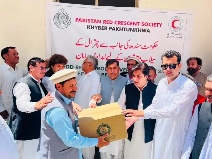 PPP leaders hand over relief goods sent by Sindh government to flood affected people of Chitral.