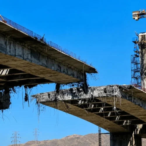 Railway bridge linking Iran to Russia and China damaged in US airstrike.