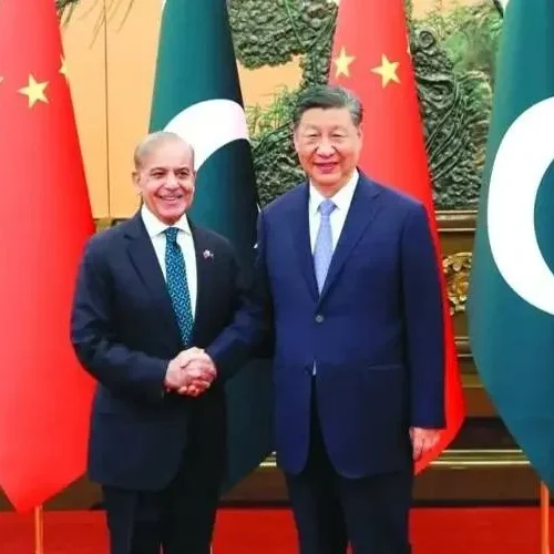 President XI shakes hands with Prime Minister Shehbaz Sharif before a meeting in Beijing, May 25, 2026.