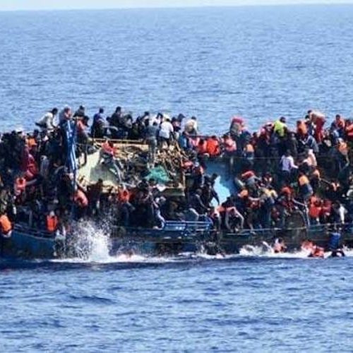 Illegal migrants seen calling for rescue in a boats.