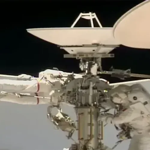 NASA releases images of the woman from France after her spacewalk outside ISS.