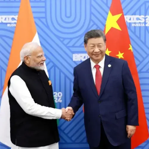 Chinese President X and Indian Prime Minister Narendra Modi.